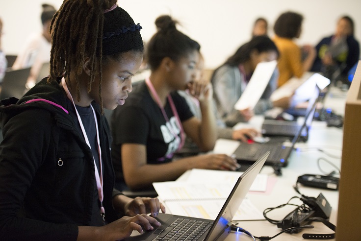 Tranarc community members learning to code