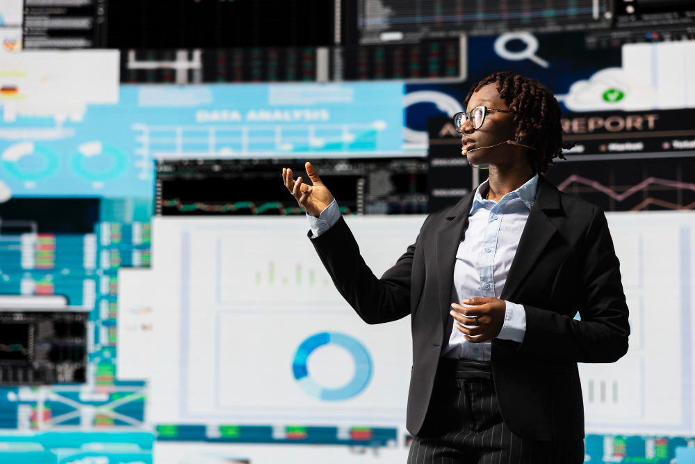 A speaker presenting data dashboards to a Tranarc community session
